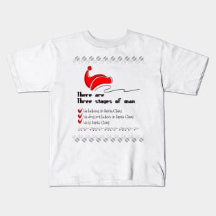 There are three stages of man, he believes in Santa Claus, he does not believe in Santa Claus, he is Santa Claus Kids T-Shirt